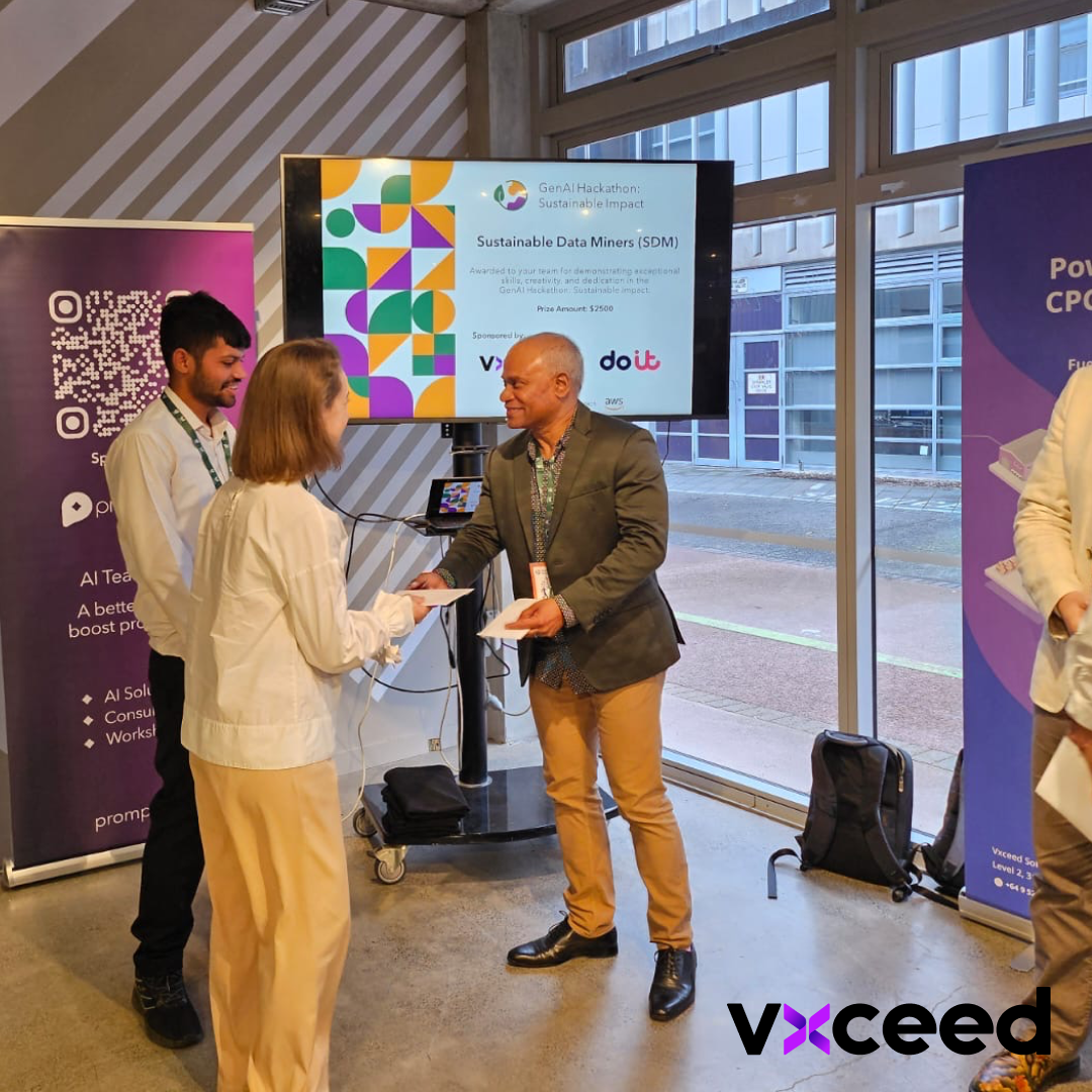 Award ceremony recognizing teams developing sustainable AI solutions at the GenAI Hackathon sponsored by Vxceed.